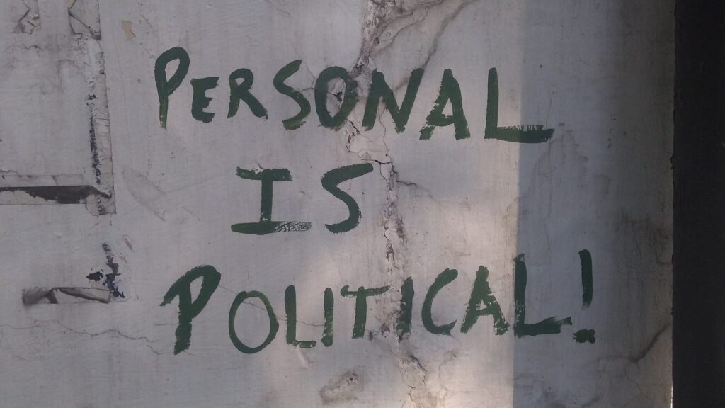 Graffiti reading Personal is Political on a university wall in Delhi